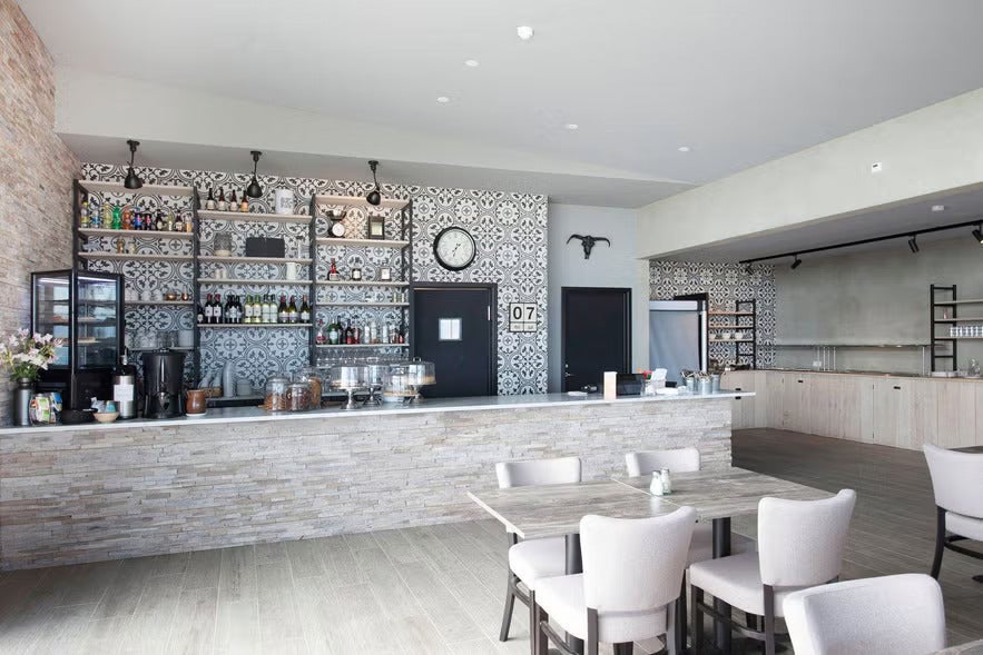 Modern interior design of Snjófell Restaurant on the Snæfellsnes Peninsula, featuring bright seating and contemporary style.