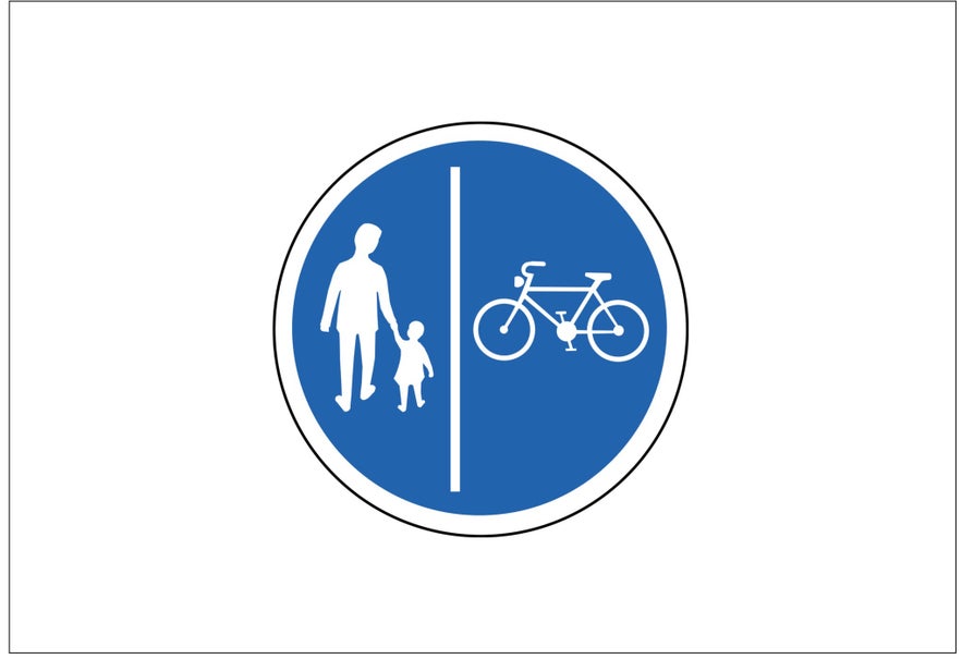 A blue circular mandatory road sign in Iceland showing separate lanes for bicycles and pedestrians indicates that cyclists and pedestrians must use their designated paths.
