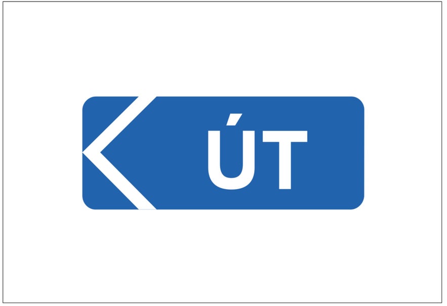 A blue sign with white writing saying "UT" in Icelandic, meaning "out" in English shows drivers which direction to go.