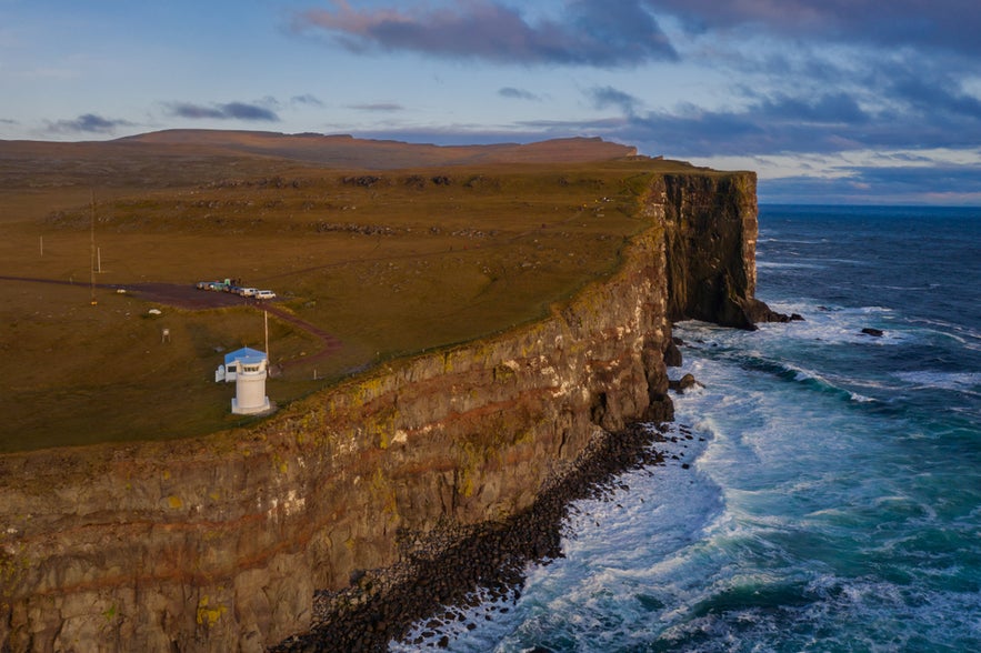 Aerial photography at Latrabjarg Cliffs shows rugged coastlines and Atlantic waves while flying drones in Iceland.
