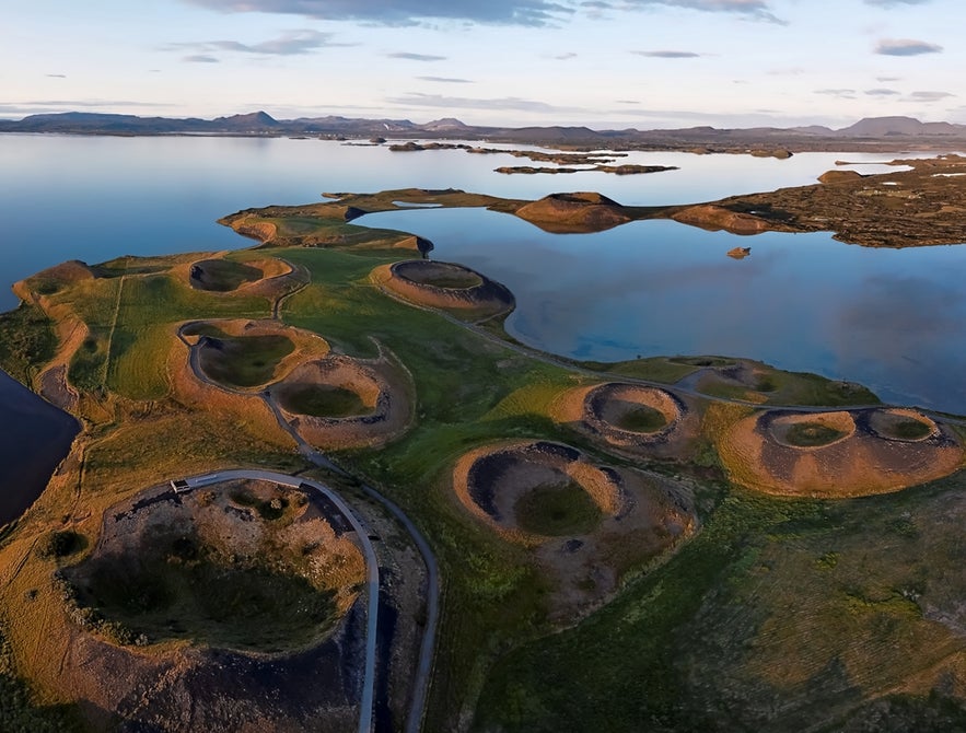 Aerial view of Lake Myvatn shows unique volcanic craters and wetlands while flying drones in Iceland’s north.