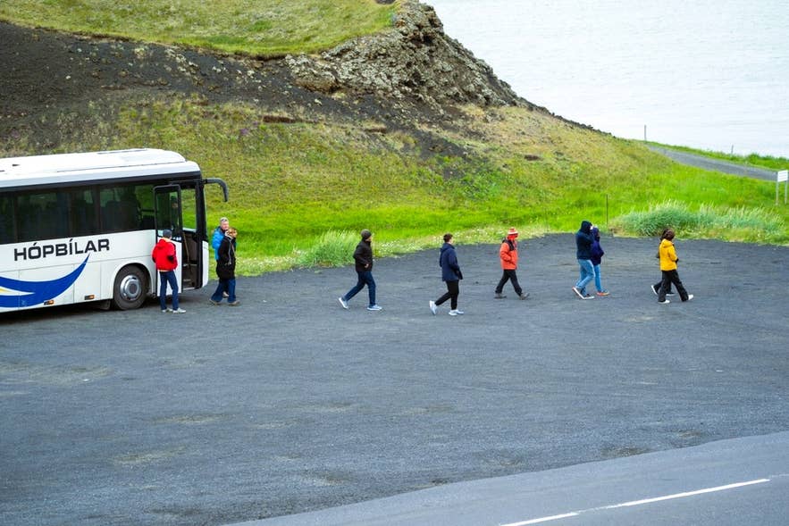Public bus traveling along the Ring Road in South Iceland