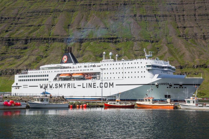 Smyril Line Norrona ferry docked in Seydisfjordur, connecting Denmark and Faroe Islands for sea transportation in Iceland.