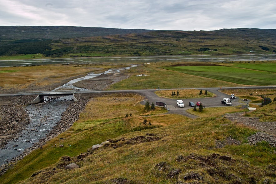 The best places to visit in East Iceland include Hengifoss Waterfall, starting from this parking area near Lagarfljot.