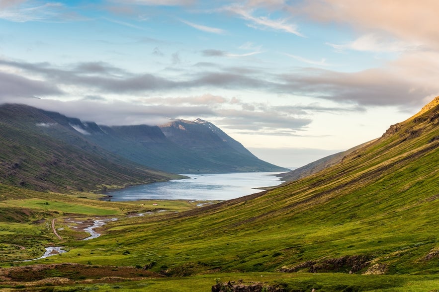 The best places to visit in East Iceland include Mjoifjordur Fjord, a remote valley with scenic hiking trails.