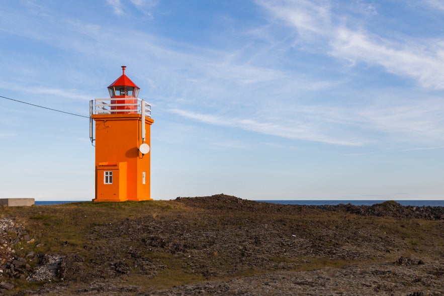 The shoreline by Hopsnesviti lighthouse is littered with shipwrecks.