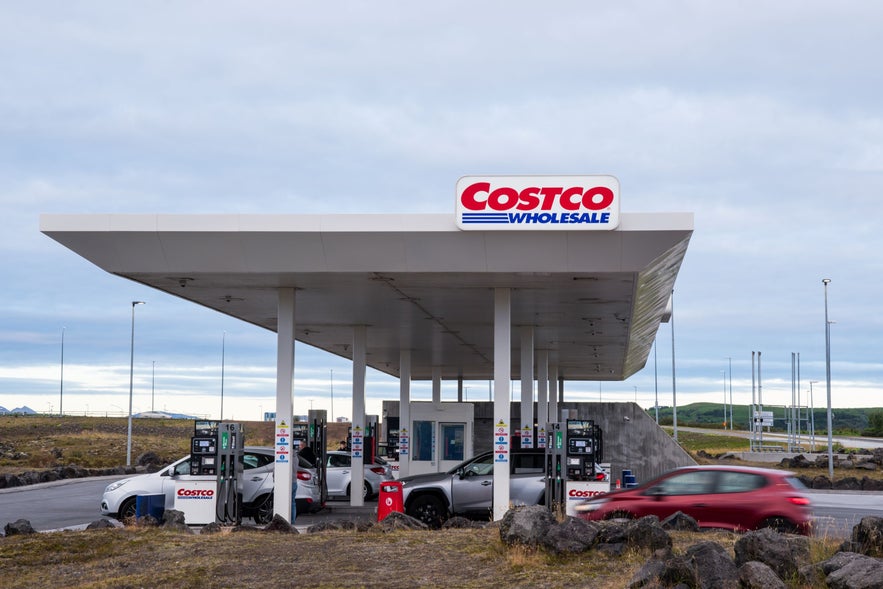 Cars refueling at a Costco gas station in Iceland.