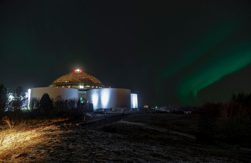 Northern lights glow above the Perlan Museum on Oskjuhlid Hill in Reykjavik.