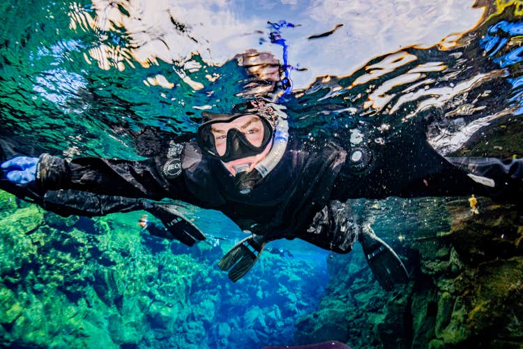 Silfra Fissure Snorkeling Tour with Free Underwater Photos and Hot Drinks