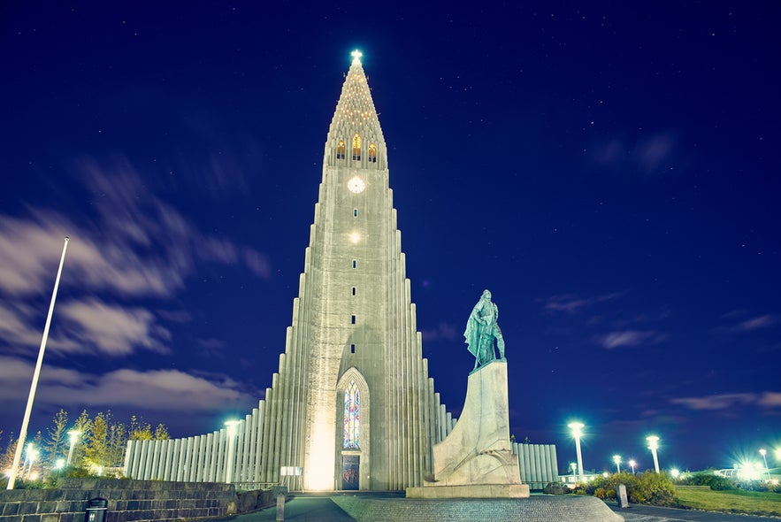 Hallgrimskirkja Church in Reykjavik at dusk with the statue of Leif Erikson, a landmark worth visiting during an October trip.