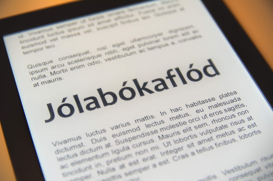 Close-up of Jólabókaflód text on screen, symbolizing the book-giving tradition at Christmas in Iceland