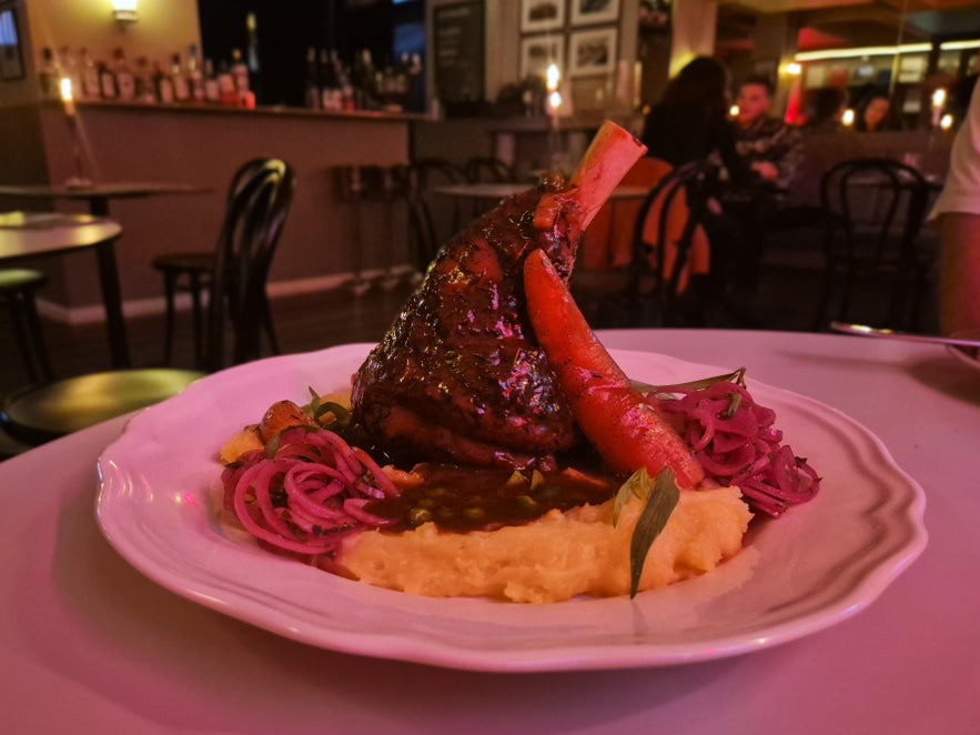 Icelandic lamb shank with mashed potatoes, carrots, and gravy served at Litli Barinn in Reykjavik.