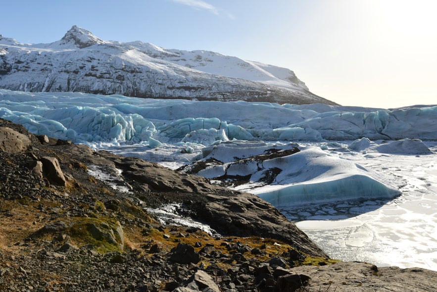 Svinafellsjokull Glacier in Vatnajokull National Park, Iceland, is a popular destination for guided glacier tours, offering visitors the chance to explore its icy landscape and surrounding natural beauty.