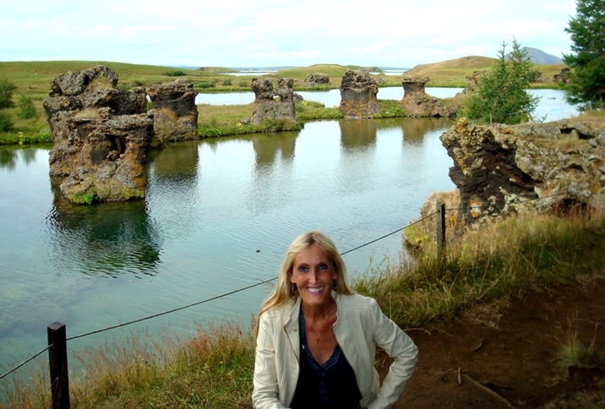 Regína by Lava pillars in the Mývatn area in northeast Iceland