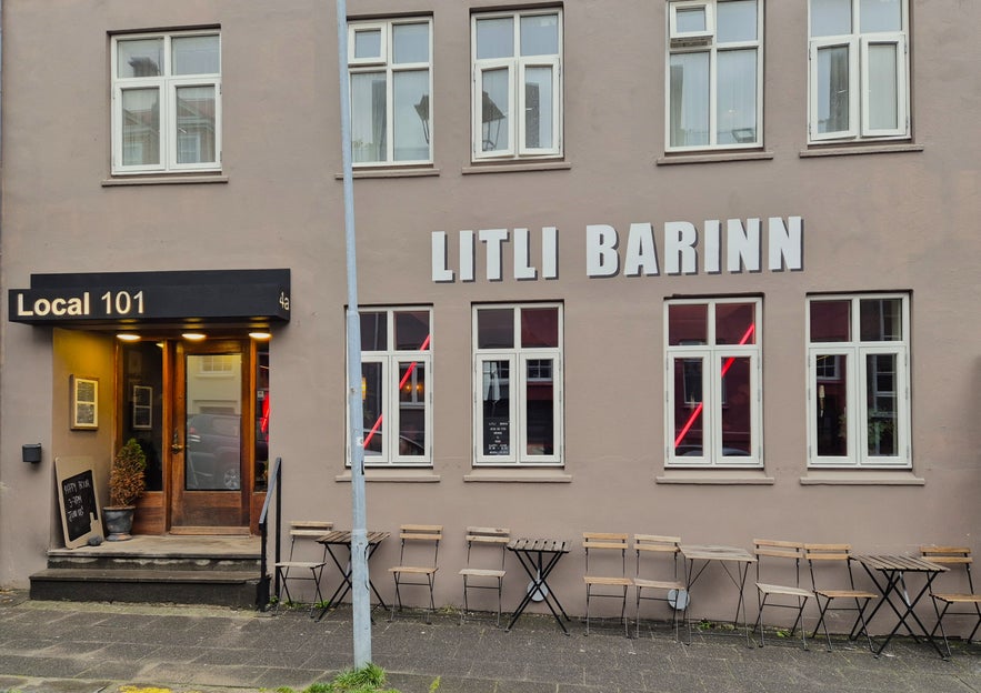 Exterior of Litli Barinn and Local 101 Hotel with outdoor tables in central Reykjavik.