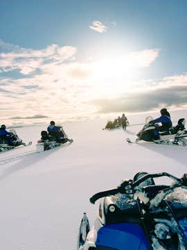 Small-Group Langjokull Glacier Snowmobile Tour from Husafell with Local Guide
