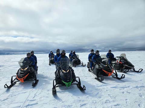 Small-Group Langjokull Glacier Snowmobile Tour from Husafell with Local Guide