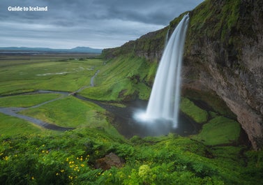 Seljalandsfoss is one of the South Coast's most beautiful waterfalls and has a path encircling it.