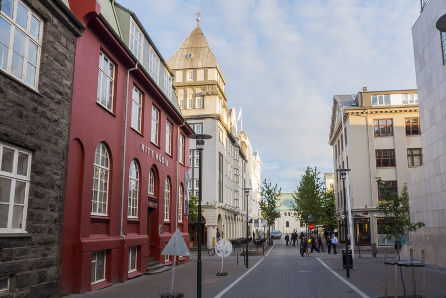 Posthusstraeti in Reykjavik with charming red old building.