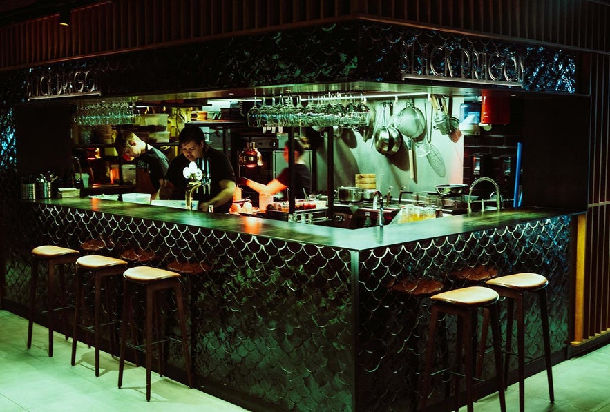 Black Dragon restaurants with employees cooking.