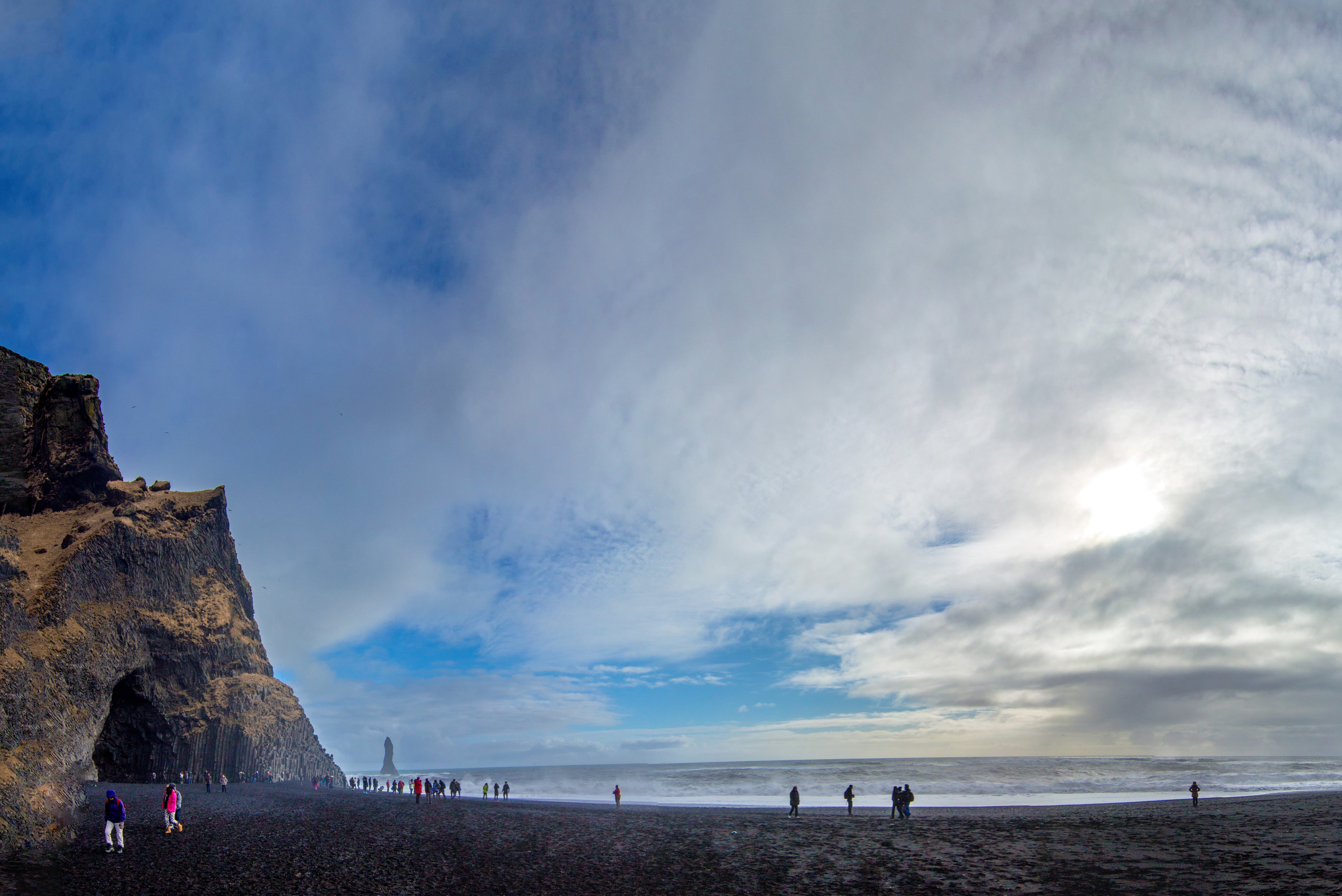 Reynisfjara Beach is renowned for its striking black sand, a result of volcanic activity that has shaped Iceland's unique landscape.