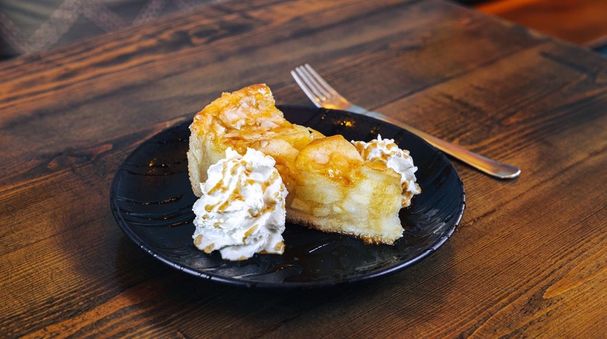 Vegan apple pie in Reykjavik with vegan whipped cream at the restaurant Salka Valka.