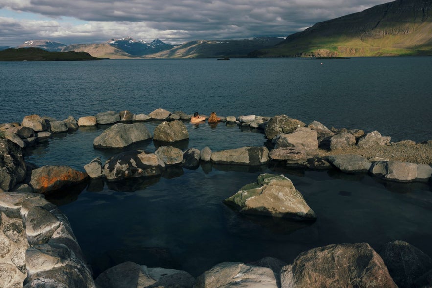 People at the hvammsvik hot springs