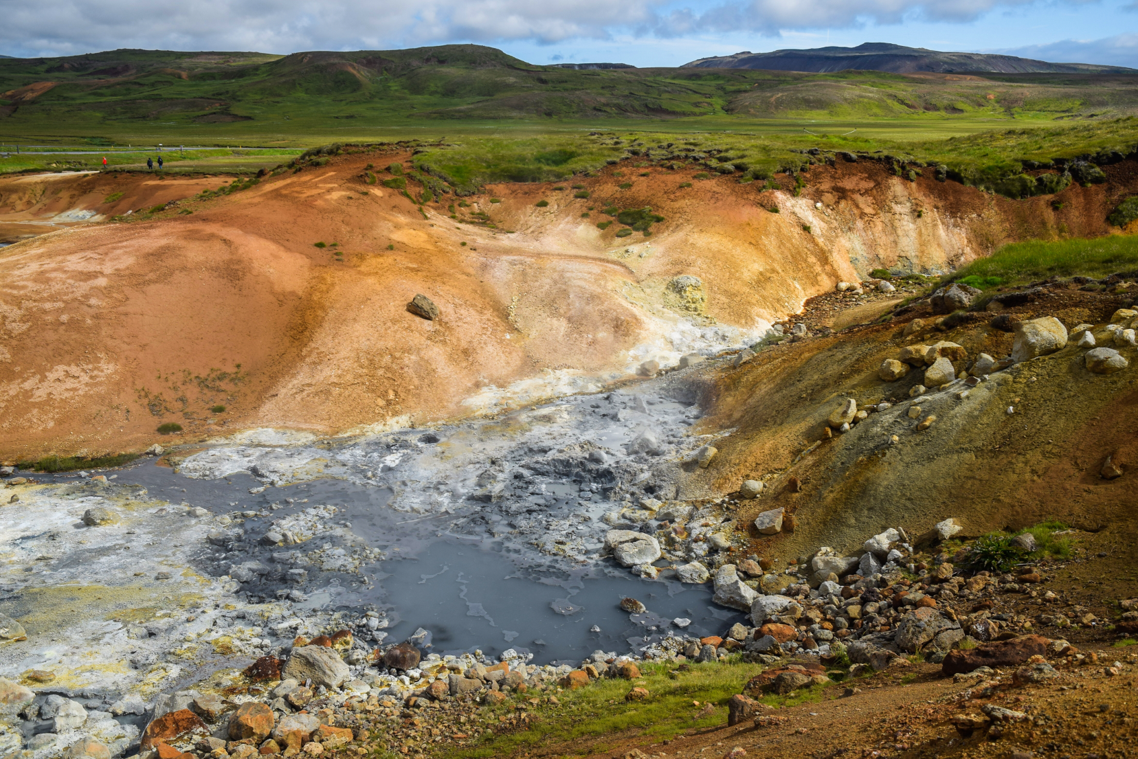 A mud pool in the middle of a well-maintained geothermal area in Reykjanes Peninsula, Iceland.