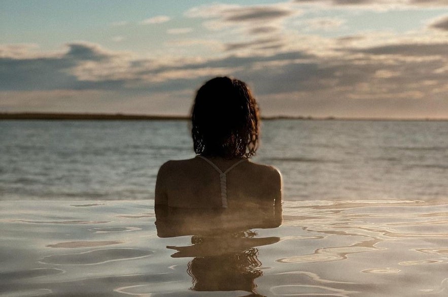 Woman enjoying the view from the Sky Lagoon in Iceland