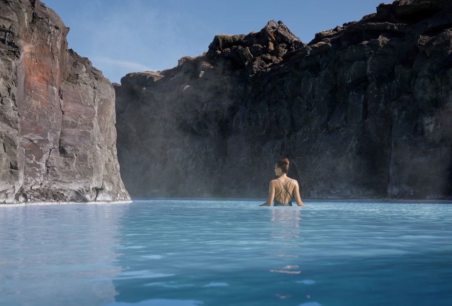 Woman at the Retreat Lagoon in the Blue Lagoon in Iceland