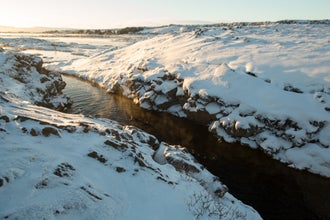 Silfra Snorkeling Tour Between Continents with Free Photos & Snacks