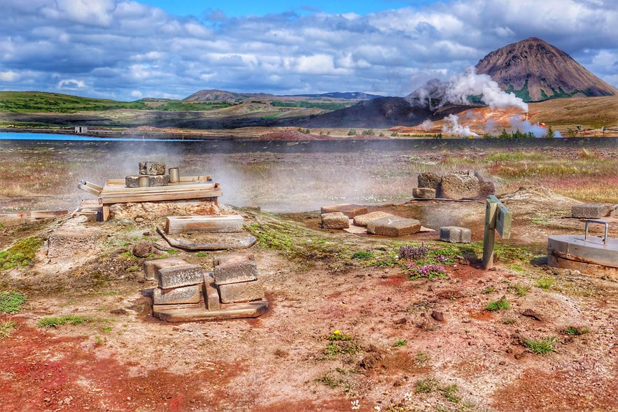 Geothermal steam vents with buried pots baking rye bread, a traditional but weird icelandic food Geothermal steam vents with buried pots baking rye bread, a traditional but weird icelandic food