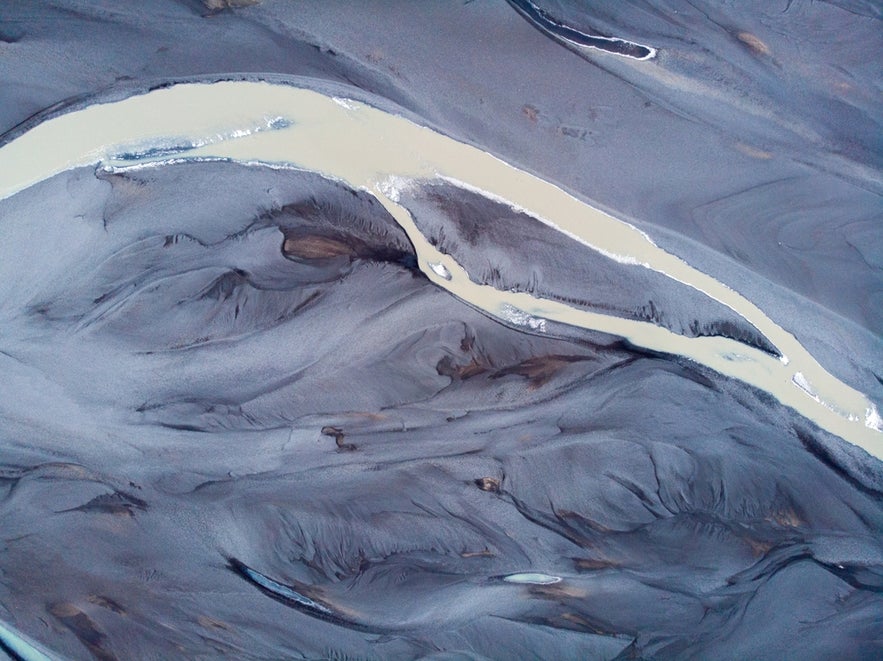 Aerial view of glacial river patterns and volcanic sand plains near Vatnajokull Glacier in South Iceland.