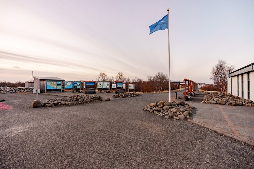Entrance area of the Skaftafell Visitor Center in Vatnajokull National Park, Iceland, with maps and information boards.