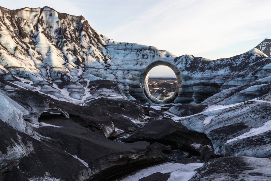 Natural ice arch formation on Myrdalsjokull Glacier within Katla Geopark in South Iceland.
