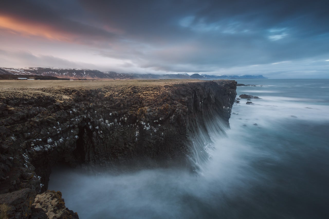 Powerful waves hitting the black cliffs at Hellnar on the Snæfellsnes Peninsula.