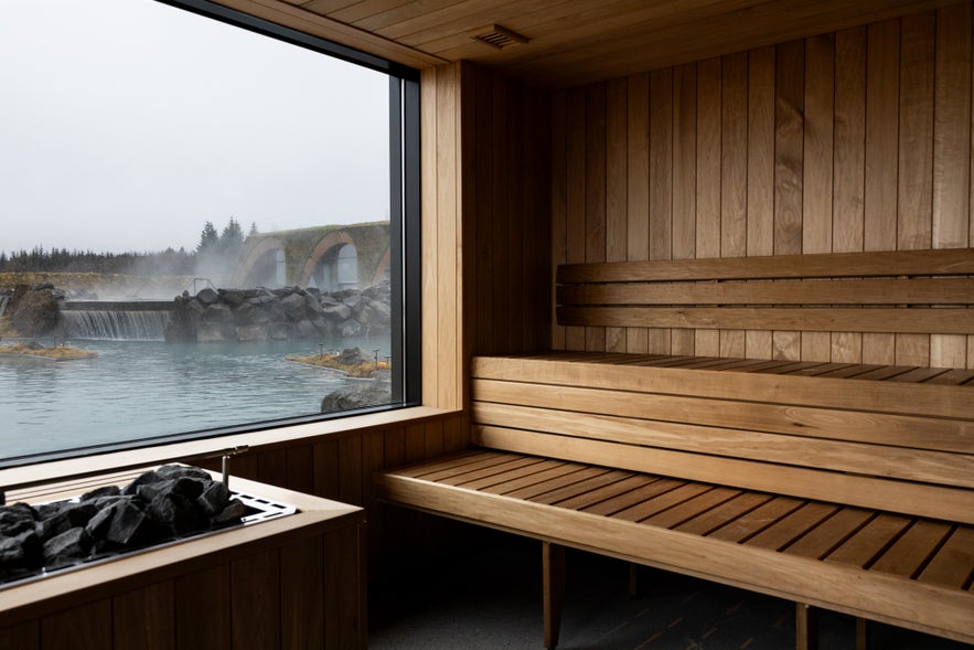 Modern wooden sauna with panoramic view of geothermal lagoon at Laugarás Lagoon, Golden Circle Iceland Modern wooden sauna with panoramic view of geothermal lagoon at Laugarás Lagoon, Golden Circle Iceland