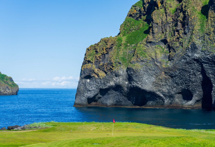 View of Elephant Rock from the Westman Islands Golf Course on Heimaey Island, Iceland.