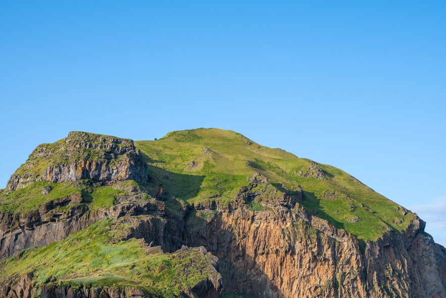Heimaklettur mountain on Heimaey Island in the Westman Islands, Iceland.