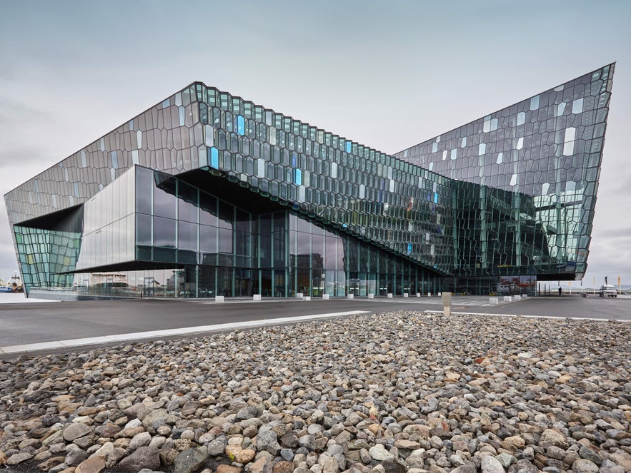 Harpa Concert Hall in Reykjavik with its glass facade showcasing modern Icelandic architecture.