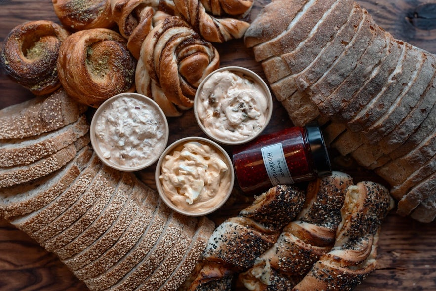Assortment of fresh breads, pastries, and creamy spreads from Hygge bakery and café in Iceland