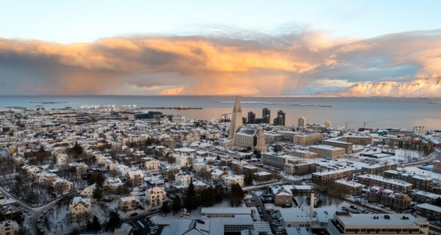 Zoomed out vie wo fthe city of Reykjavik with the fjord seen in the distance. 