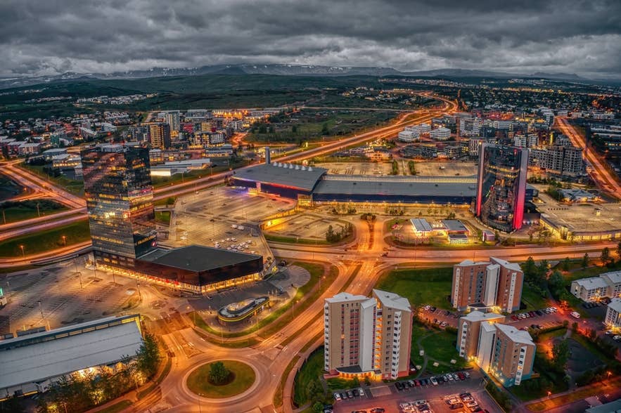 Aerial view of a Reykjavik district at dusk with apartment towers and residential blocks. Aerial view of a Reykjavik district at dusk with apartment towers and residential blocks.