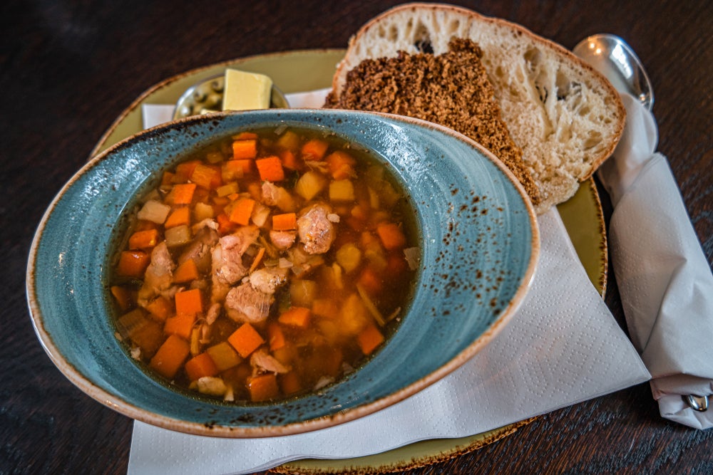 Traditional Icelandic lamb soup, bread and butter . Traditional Icelandic lamb soup, bread and butter .