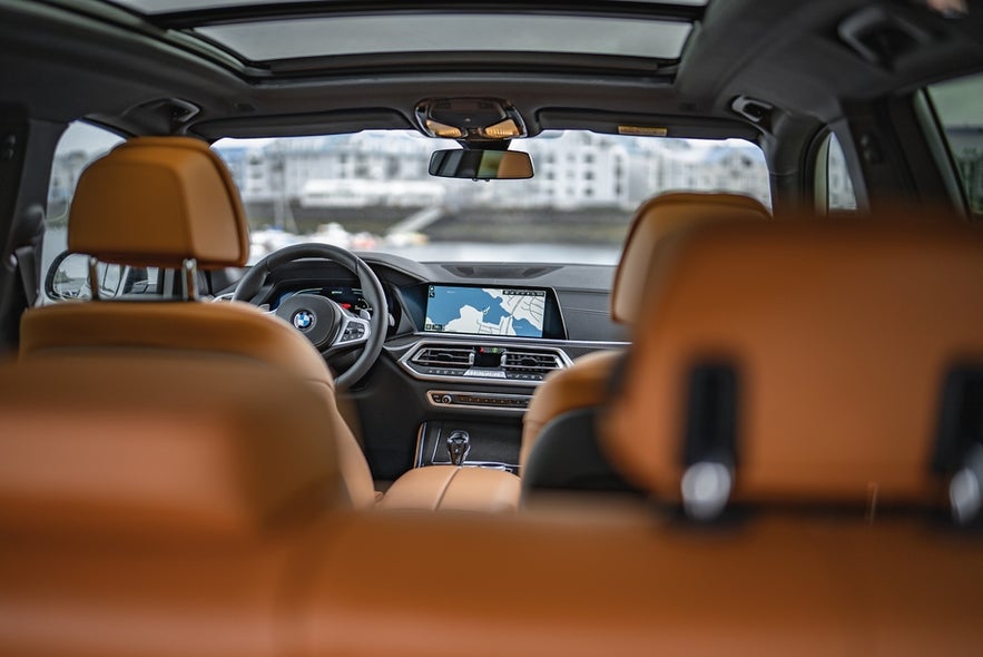 A rental car in Iceland equipped for a road trip.