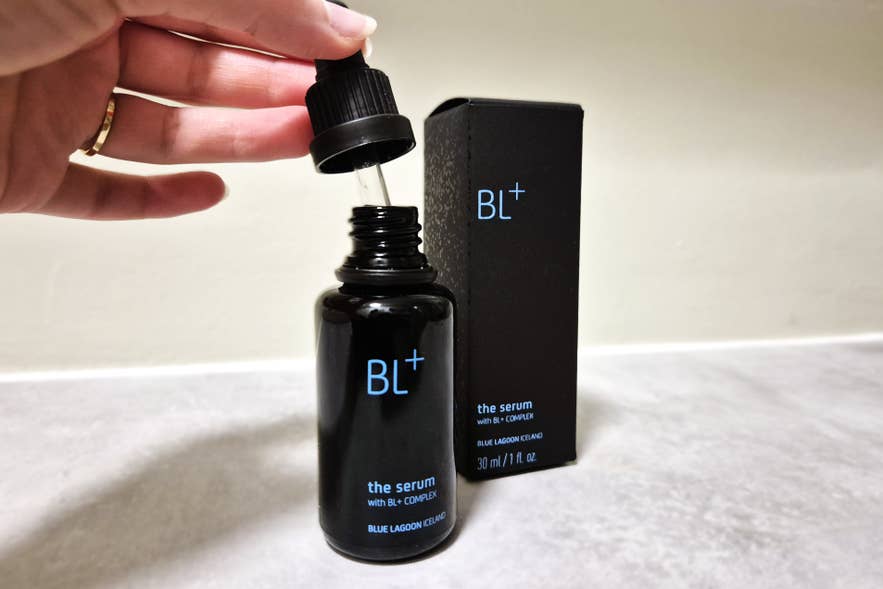 Close-up of BL+ serum by Blue Lagoon Skincare with dropper bottle and box, showing the serum being opened for use.