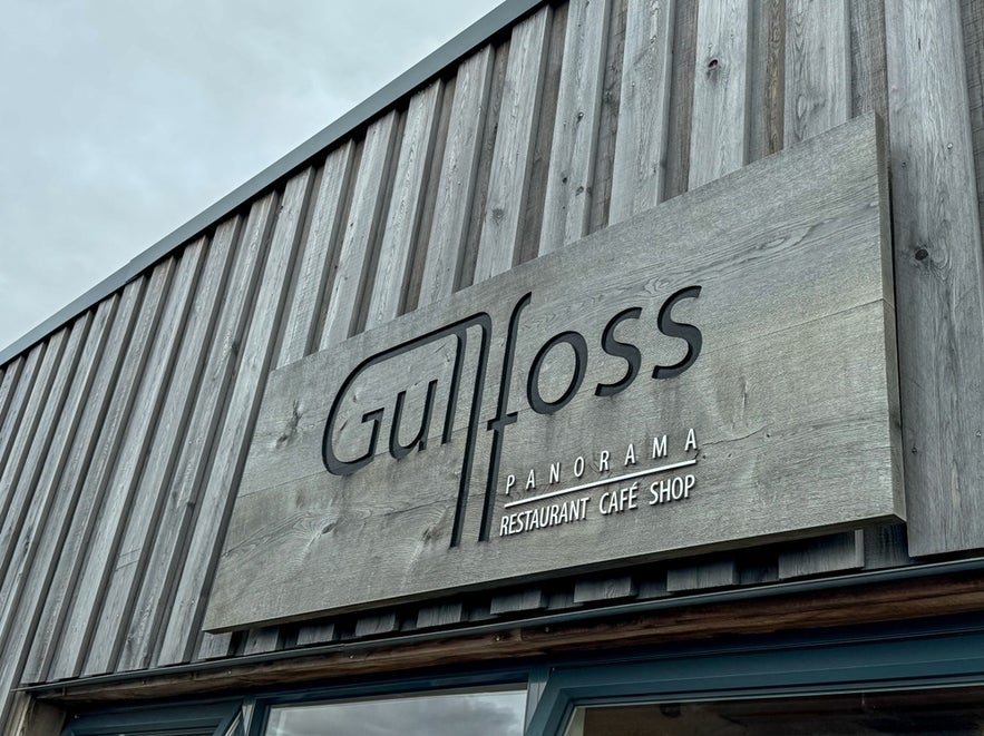 Sign for the Gullfoss Panorama Restaurant and Cafe at the Gullfoss Waterfall Visitor Center in Iceland.