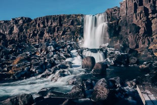 Experience tranquility amidst the picturesque Öxarárfoss waterfall on our Private Golden Circle Tour.