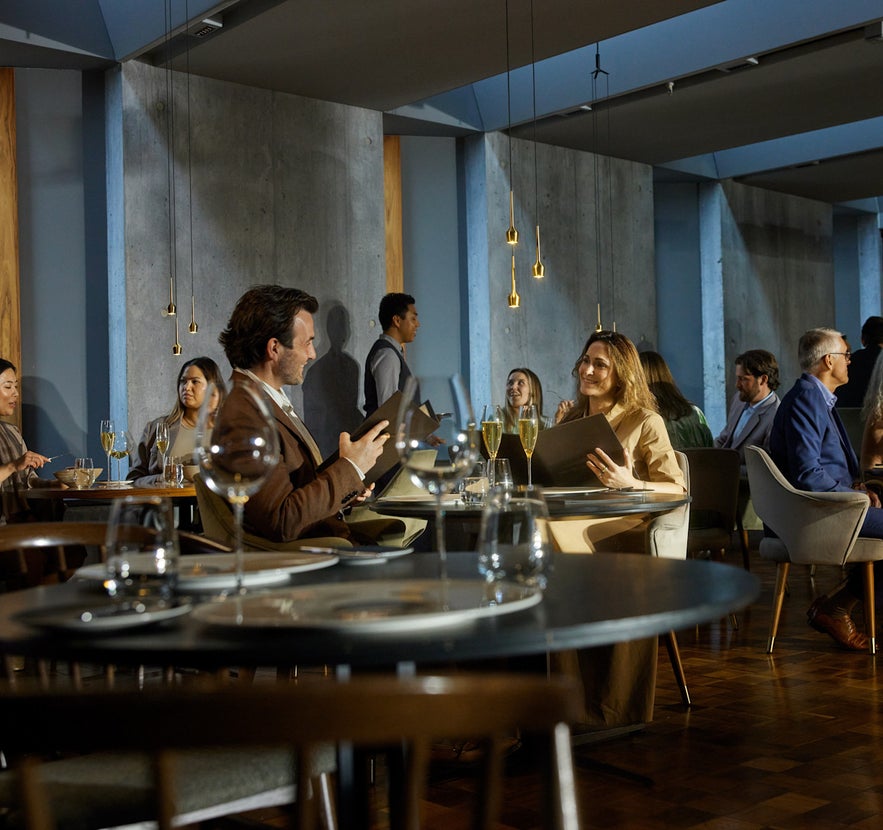 Couples dining at Moss Restaurant at the Retreat Hotel by the Blue Lagoon in Iceland.