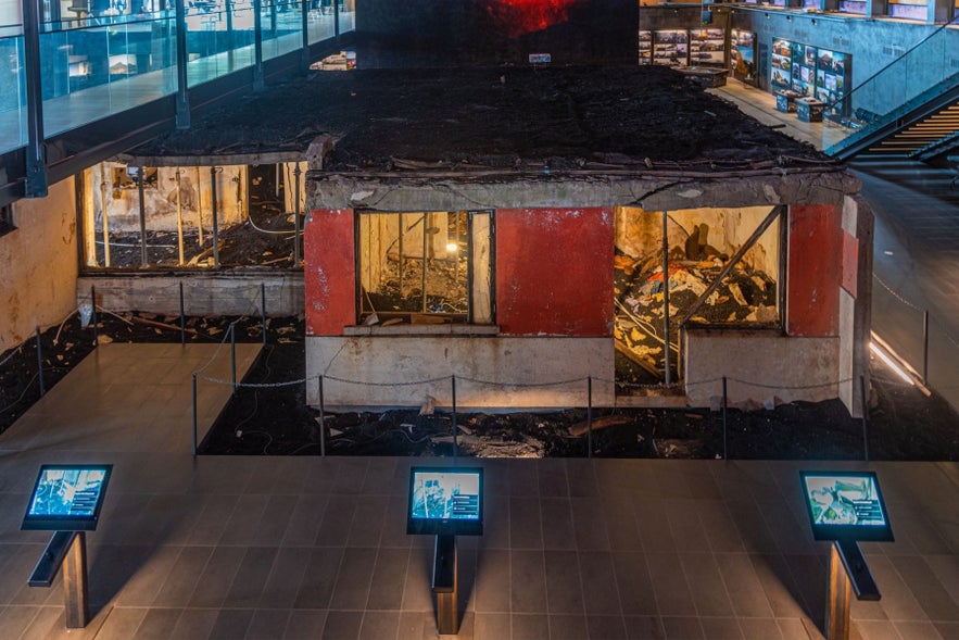 Eldheimar Museum in Heimaey, Westman Islands, showing a house preserved in volcanic ash from the 1973 eruption.